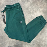 STONE ISLAND PATCH LOGO JOGGERS GREEN PAINT WASH