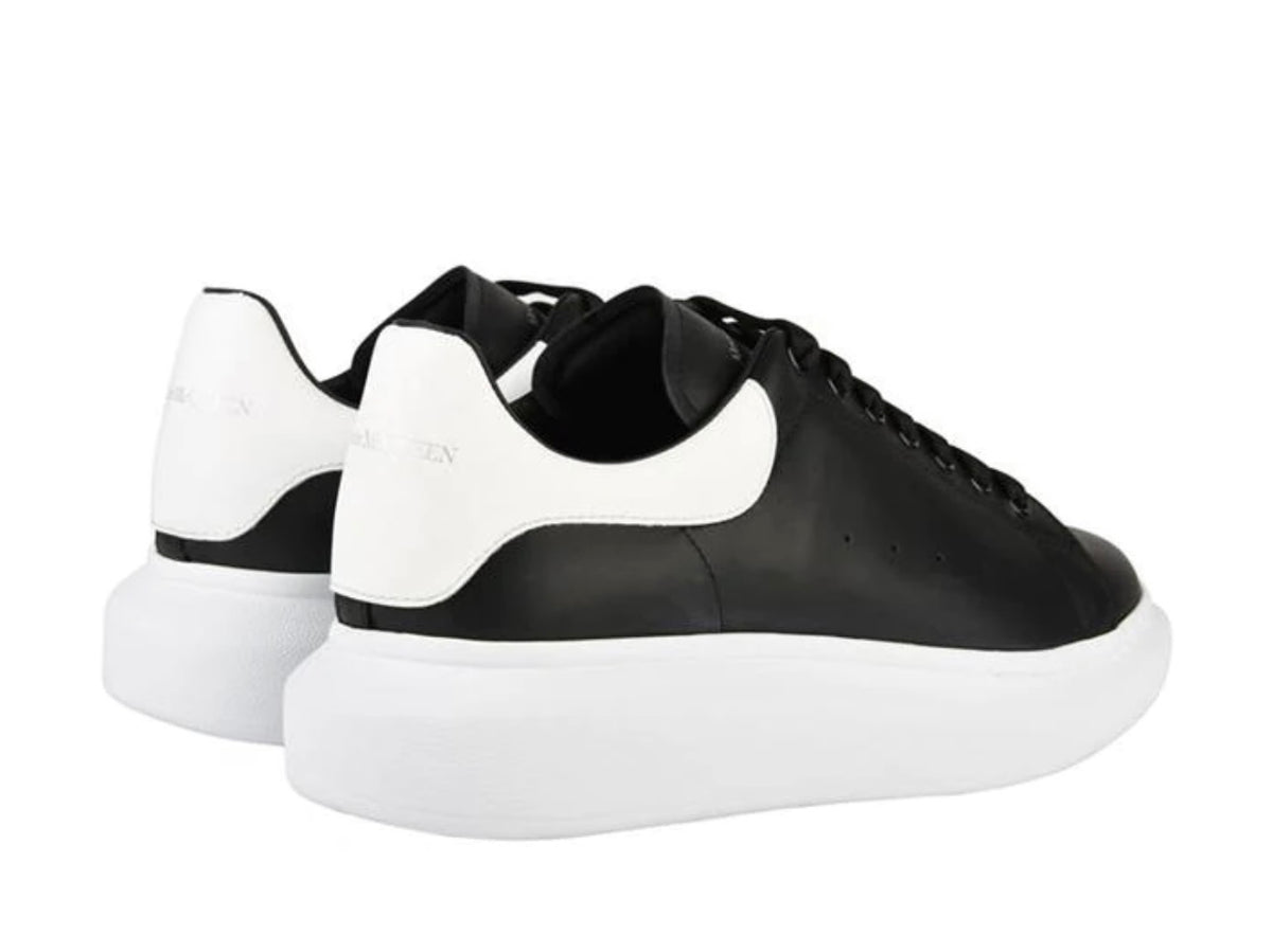 ALEXANDER MCQUEEN LEATHER OVERSIZED TRAINERS  BLACK / WHITE
