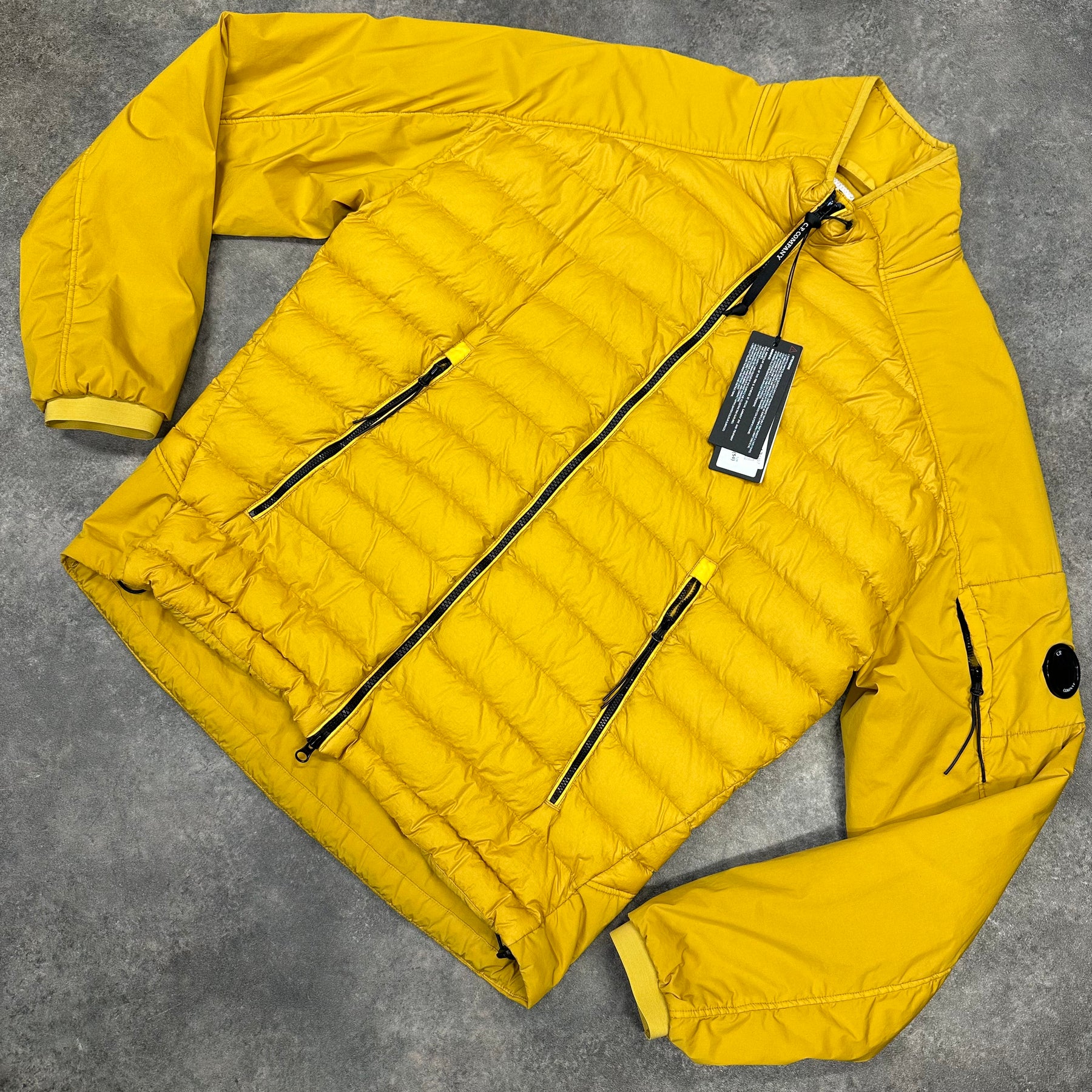 CP COMPANY LENS PUFFER JACKET YELLOW
